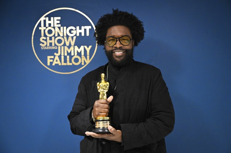Questlove poses backstage at "The Tonight Show Starring Jimmy Fallon" with his Academy Award on March 28, 2022.