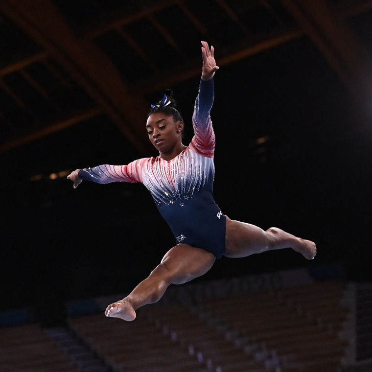 Simone Biles competes in the artistic gymnastics women's balance beam final at the Tokyo 2020 Olympic Games.