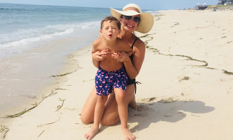 The author during a beach trip with her 8-year-old son, Will.