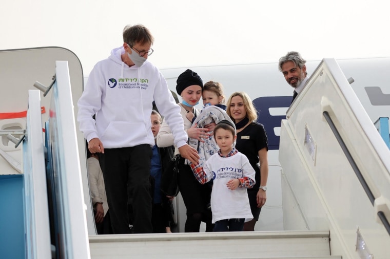 The children and their caregivers exiting the plane, safely in Israel. 