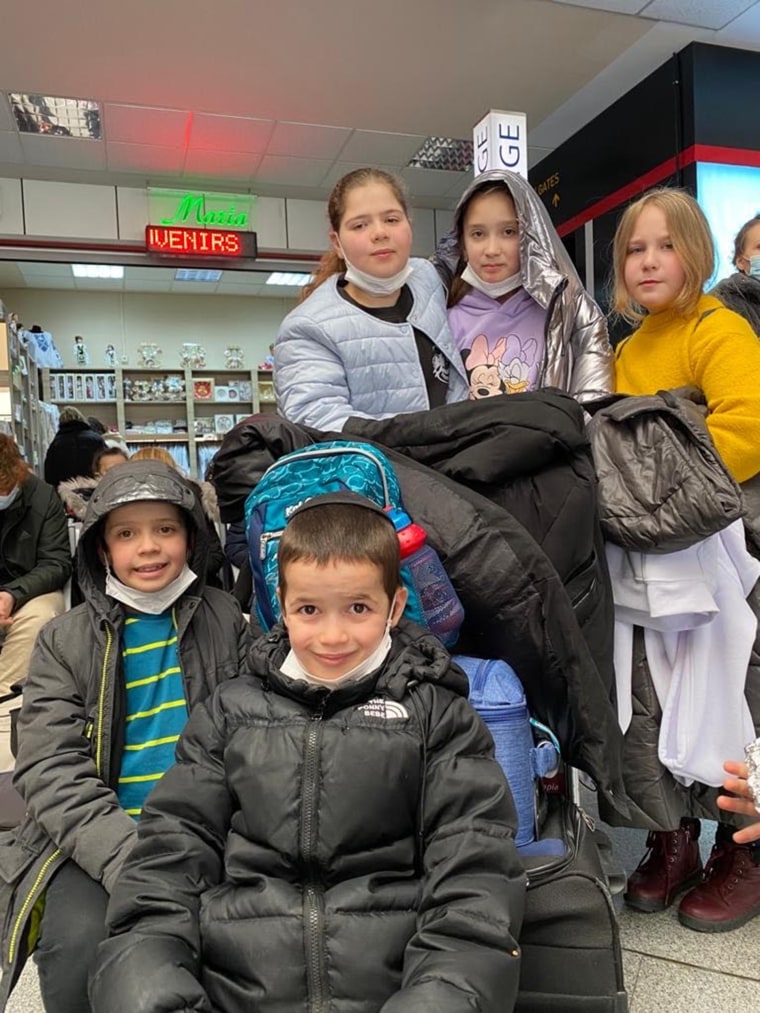 The children, pictured here, waiting to board a plane to Isreal.
