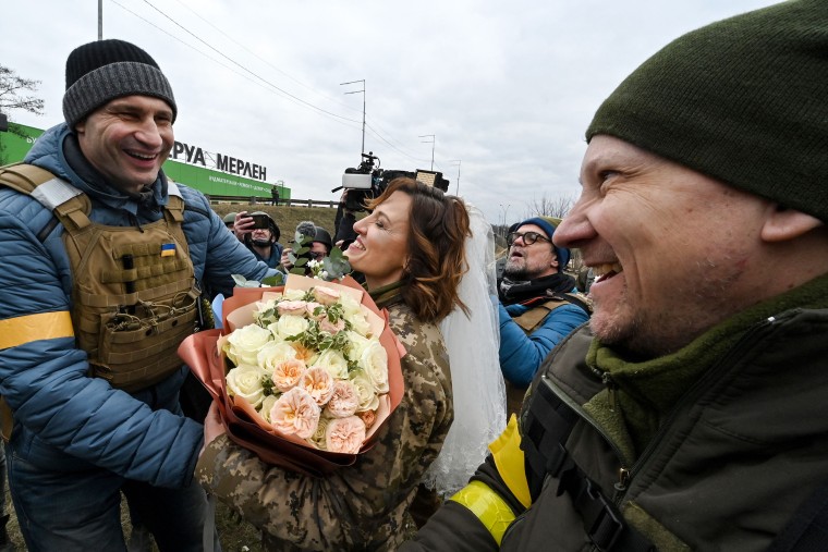 Kyiv mayor Vitali Klitschko was there to congratulate the couple on their wedding near the battle front in Kyiv.