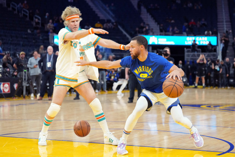 In “Semi-Pro” costume, actor Will Ferrell warms up with Klay