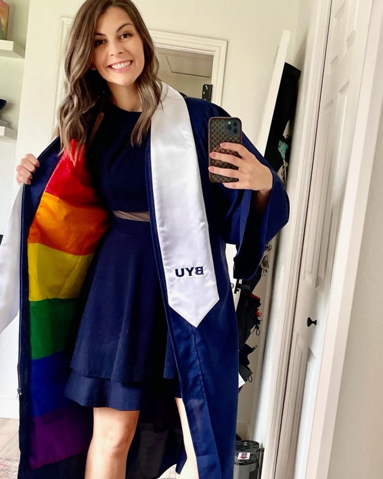 Jillian Orr shows a peek of the rainbow flag under her gown. 