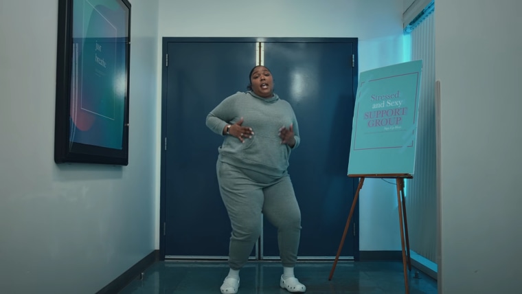 Lizzo walks out of a support group to offer her fans the kind of support they can't get enough of in the video for "About Damn Time."