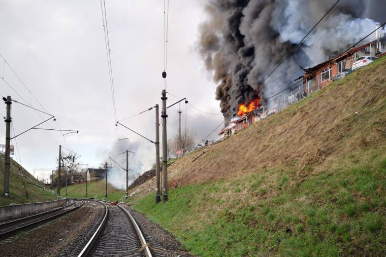 Damage caused by shelling close to the train station in Lviv on Monday. 