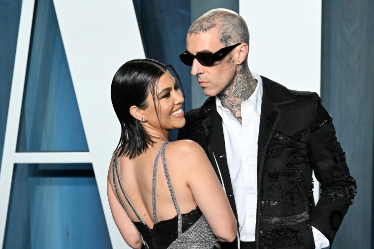 Image: Kourtney Kardashian and Travis Barker at the Vanity Fair Oscar Party in Beverly Hills, Calif., on March 27, 2022.