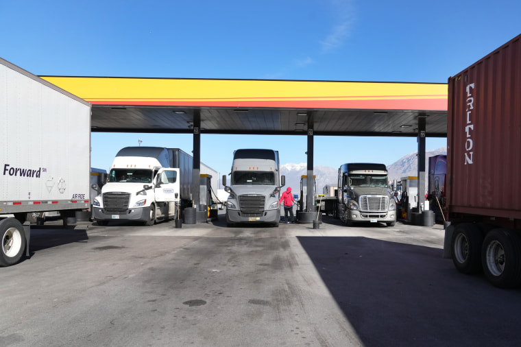 Image: Truckers fuel up their trucks at the Loves Truck stop