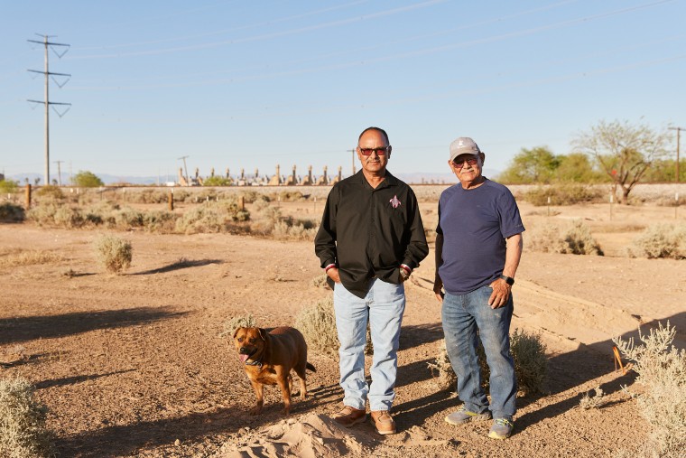 Image: Jeff and Ron Jordan in the backyard of Ron's property.