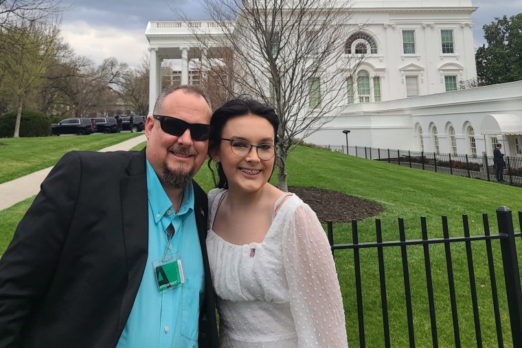 Jeff Walker and his daughter Harleigh of Auburn, Ala. stand outside the White House in Washington, D.C. during the Transgender Day of Visibility on Mar. 31, 2022.