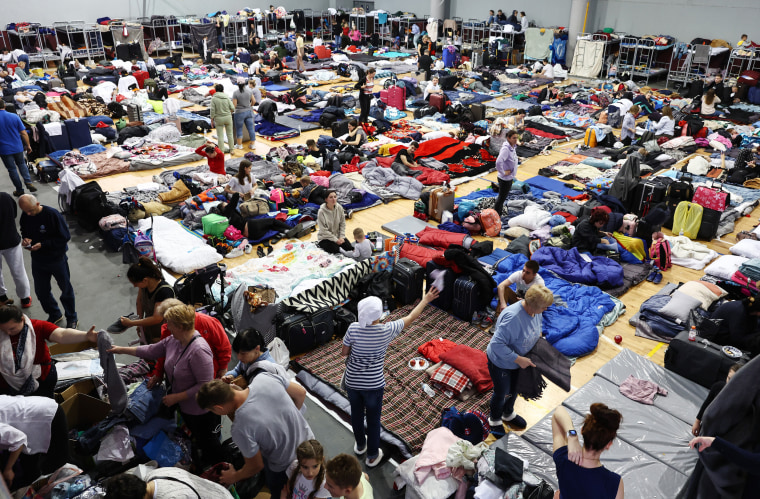 Image: Ukrainians Gather At Border In Mexico With Hopes Of Entering United States