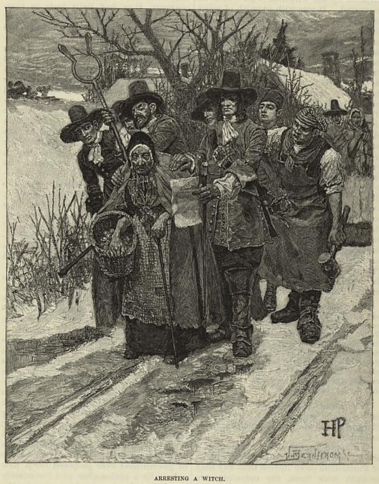 An engraving depicts citizens arresting a witch in New England.