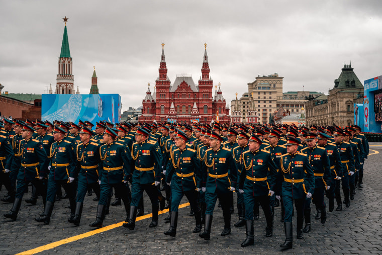 Image: Russian servicemen march along Red Square during the Victory Day military parade in Moscow on May 9, 2021.