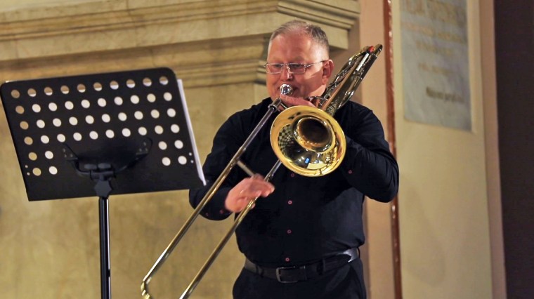 Igor Shapovalov, the musical director of the Luhansk Philharmonic Orchestra, plays the trombone in Lviv, Ukraine.

