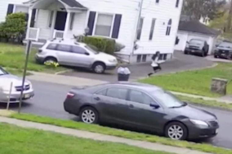 Home surveillance video shows the moment a driver is chasing a woman and then hitting her.