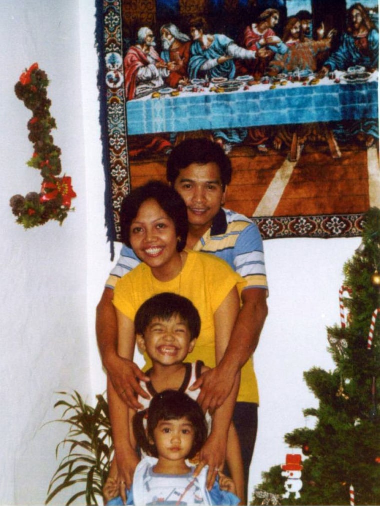 April Julian and her family in the Philippines.