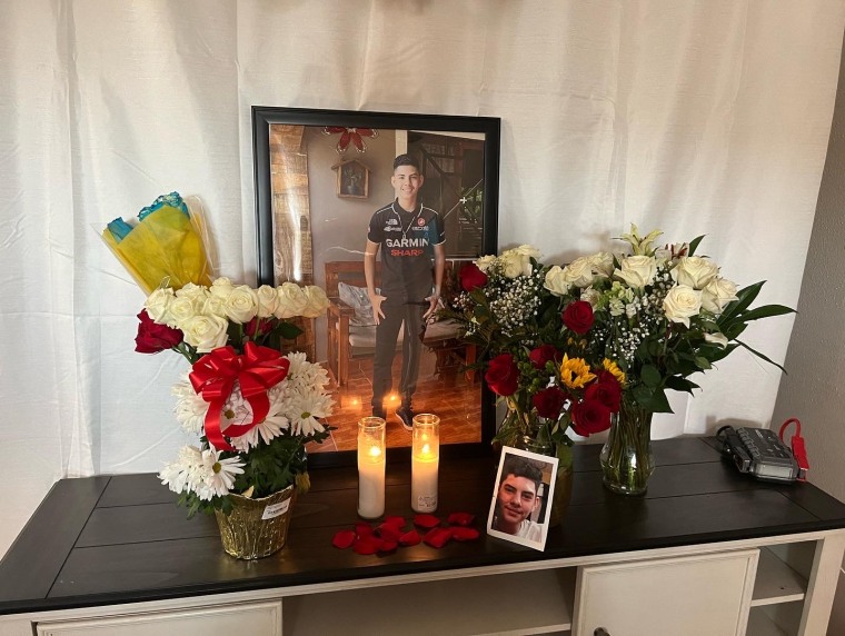 A photo of Cristopher Alvarado Sabillón, 14, stands over a small altar in his mother's house in Houston.