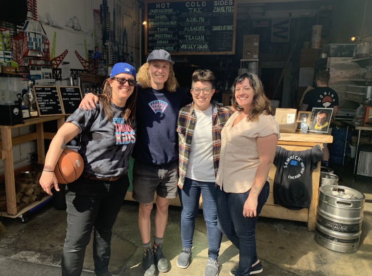 From left, Mel McMillan, Charlie Sprinkman and the owners of catering company Two Spoons PDX, Laura Taki and Rachel Arenas.﻿