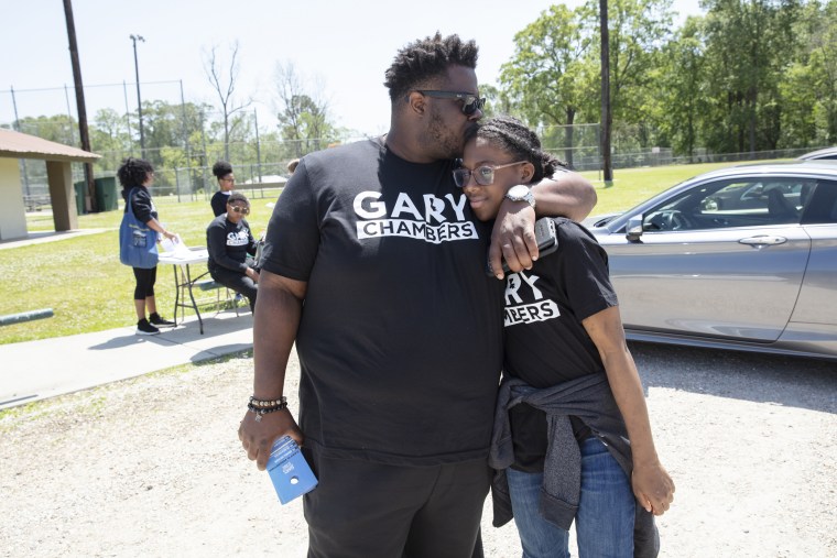 Image: Gary Chambers with his daughter Zoey in Baton Rouge, La., April 10, 2022.