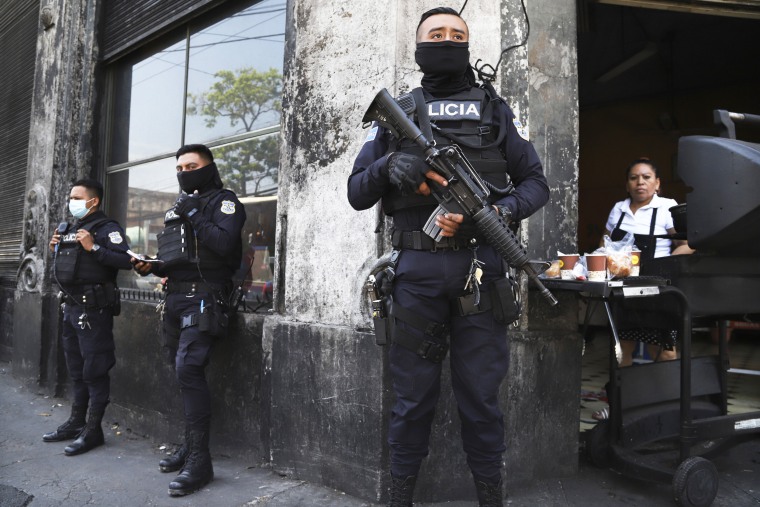 Heavily armed police guard the streets in down town San Salvador