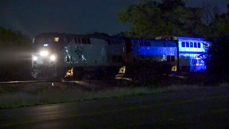 A train collided with a vehicle, killing two people in northeast Harris County, Texas, on April 16, 2022.