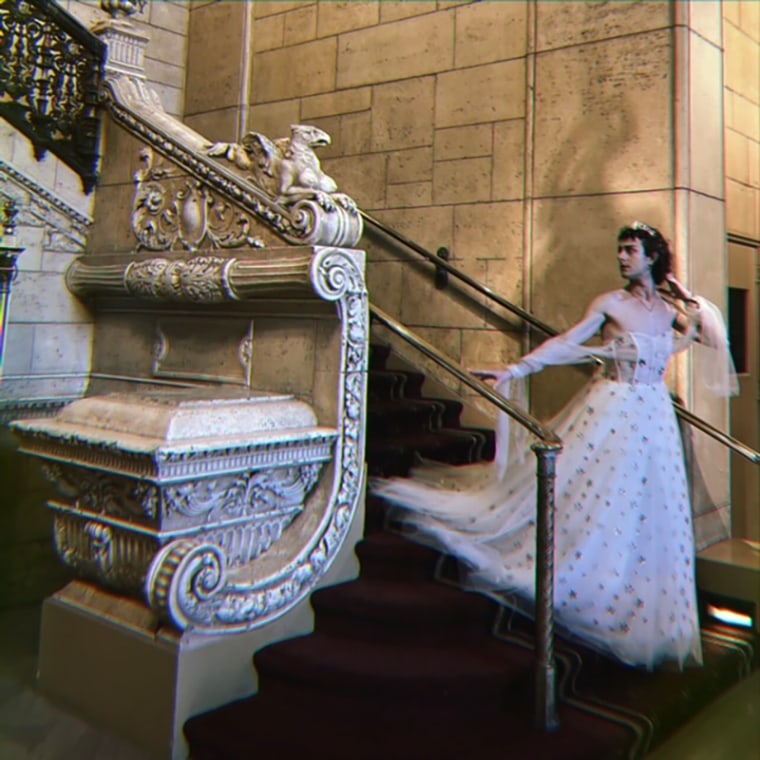 Matthea Nava comes down a staircase at "The Queen's Ball: A Bridgerton Experience."