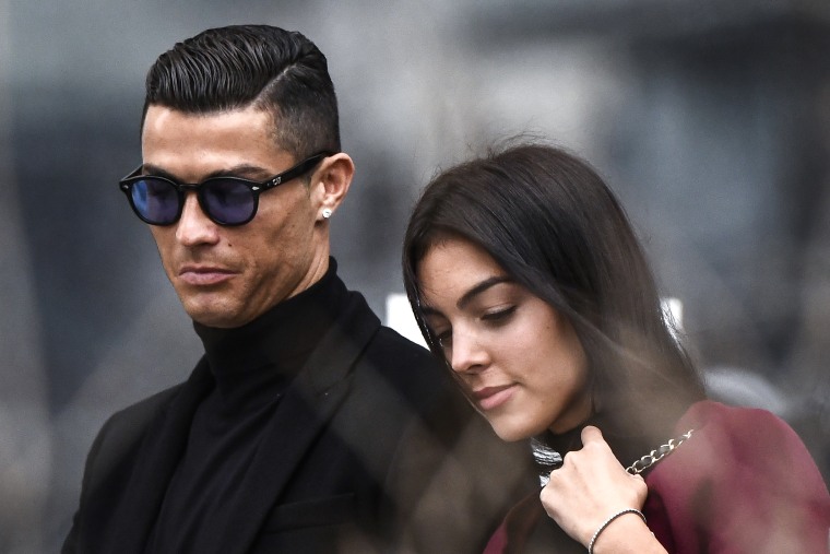 Cristiano Ronaldo leaves with his partner Georgina Rodriguez after attending a court hearing in Madrid on Jan. 22, 2019.