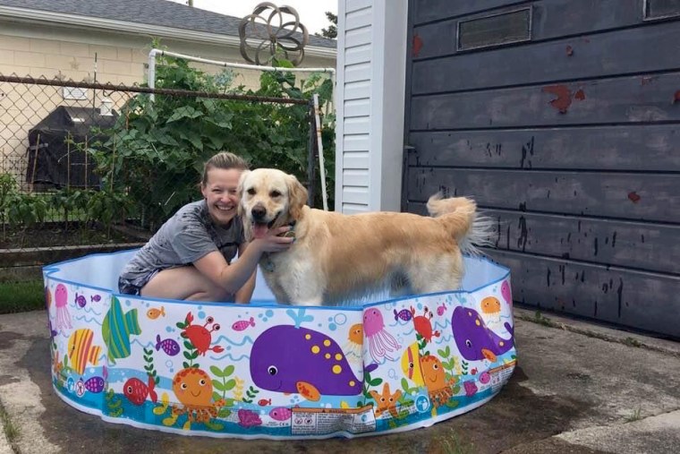 Holly LaMontagne relaxes with her dog, Howie.