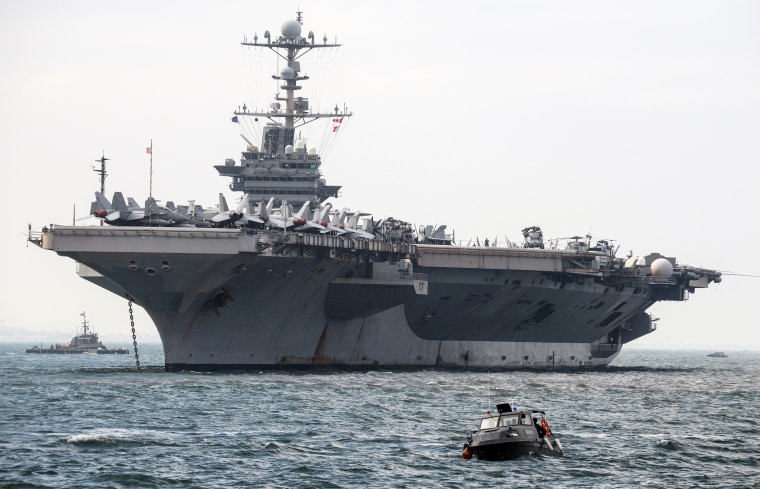 The nuclear-powered USS George Washington Nimitz-class aircraft carrier arrives in Manila on Oct. 24, 2012.