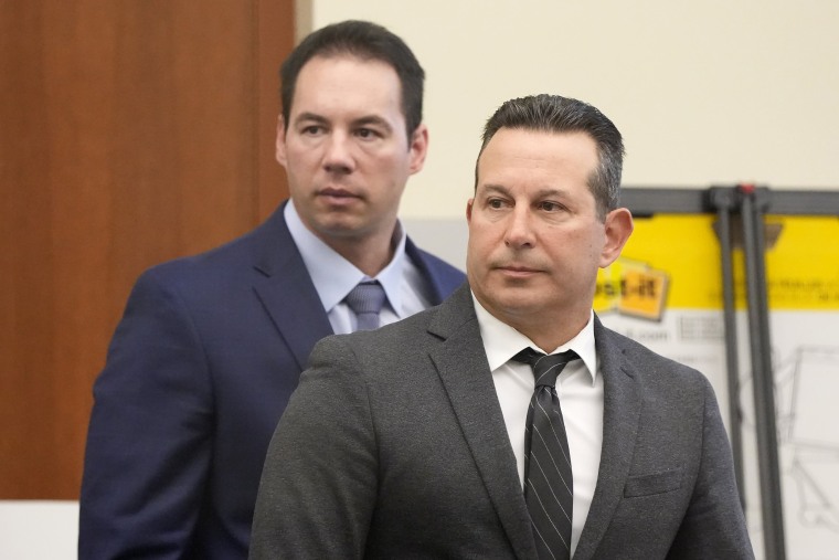 William Husel, left, and defense attorney Jose Baez at Husel's trial in February.