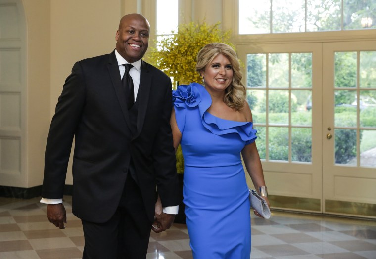 Craig Robinson and his wife Kelly Robinson arrive at a state dinner in Washington on Aug. 2, 2016.