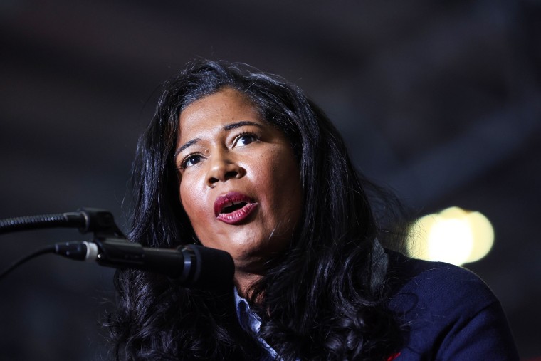 Kristina Karamo, who is running for Michigan Republican party's nomination for secretary of state, speaks at a rally hosted by former President Donald Trump on April 2, 2022, near Washington, Mich.