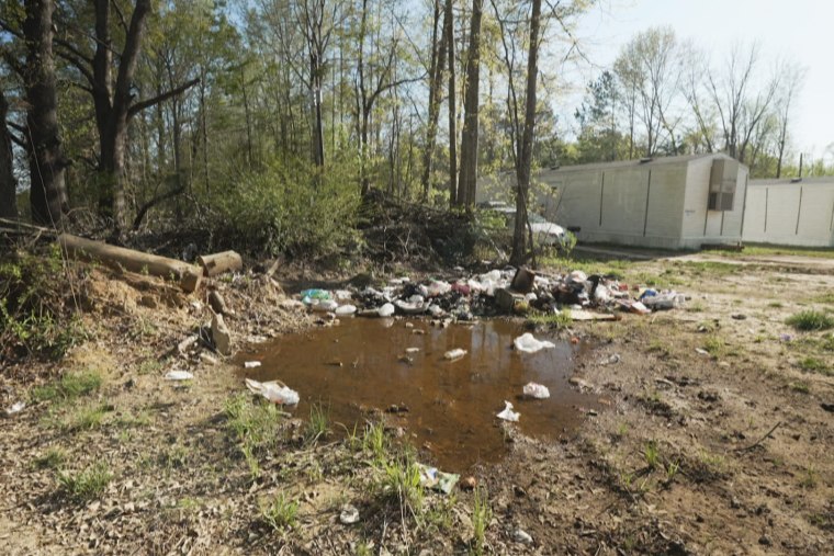 Raw sewage and debris pool into backyards in Hayneville, Ala.