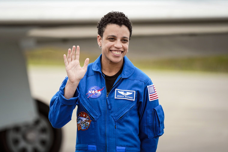 Image: NASA astronaut, mission specialist, Jessica Watkins waves as she arrives with "Crew4" astronauts at the Kennedy Space Center in Cape Canaveral, Fla., on April 18, 2022.