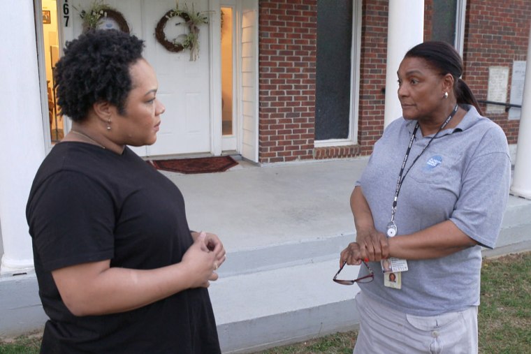 Yamiche Alcindor, left, interviews Sherry Bradley, Director of the Office of Environmental Services in the state Department of Public Health.