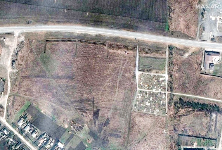 Maxar satellite imagery of the expansion of the mass grave site on the northwestern edge of Manhush, Ukraine, 12 miles north of Mariupol.