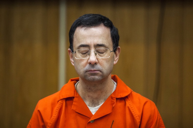 Image: Larry Nassar listens during his sentencing at Eaton County Circuit Court in Charlotte, Mich., on Feb. 5, 2018.