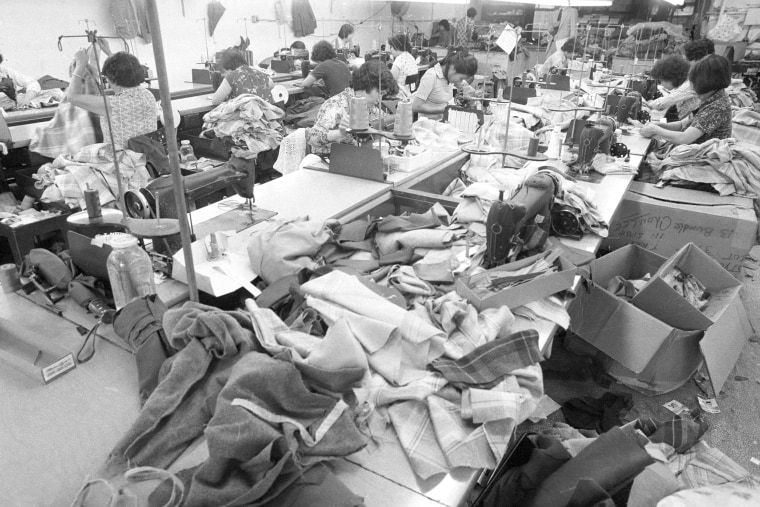 Women Sewing Clothes In Chinatown