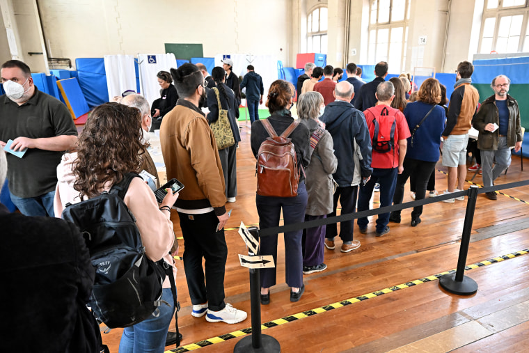 Members of the public cast their votes