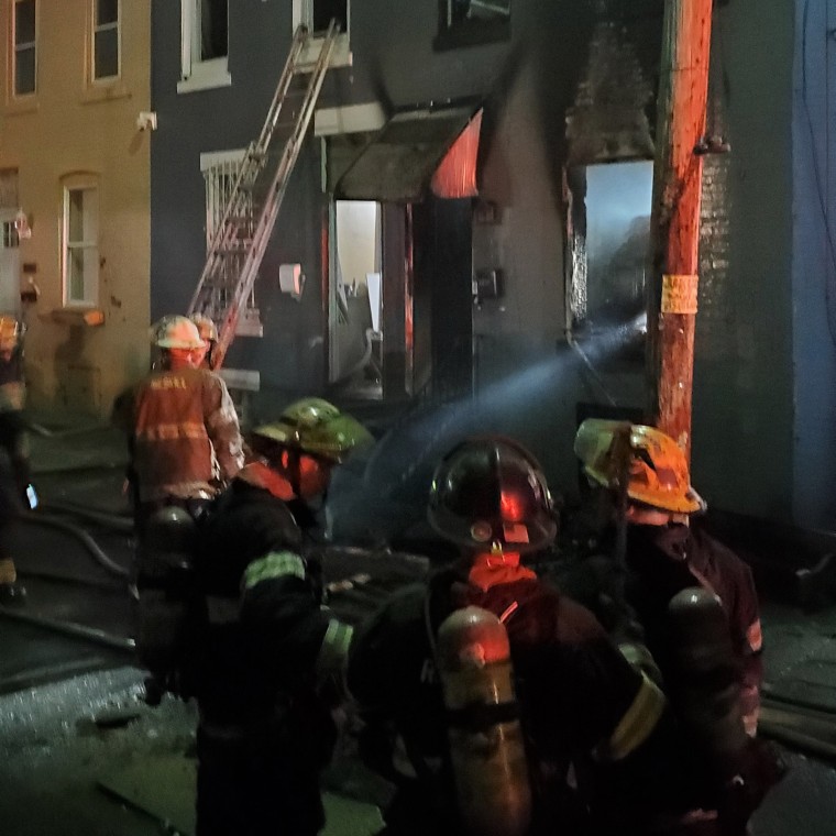 Firefighters at the scene of a fire in Philadelphia on Apr. 24, 2022