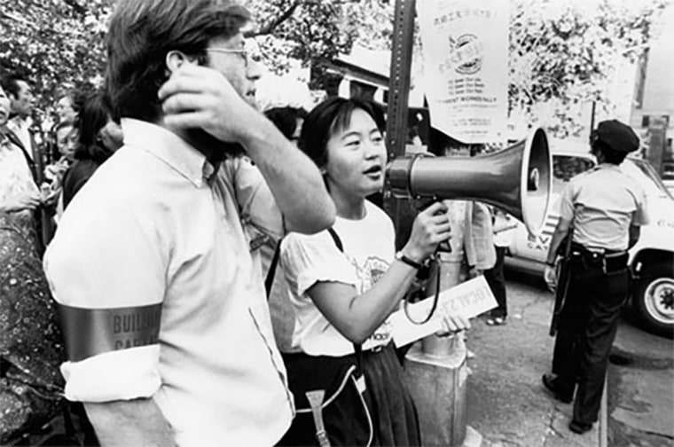 ILGWU Local 23-25 ​​members and rally organizers at the Chinatown Rally in support of the new union contract held in Columbus Park, New York.  Demonstrations took place on June 24, 1982 and July 15, 1982.