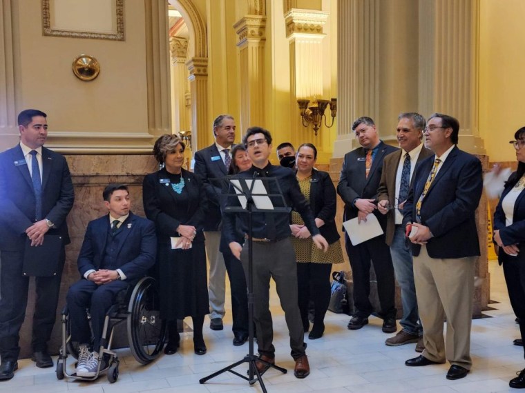 Gonzalo Guzman of Colgate University speaks at the installation of the Maestas case sculpture at the State Capitol in Denver.