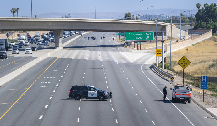 A boy is killed in road-rage freeway shooting in Orange