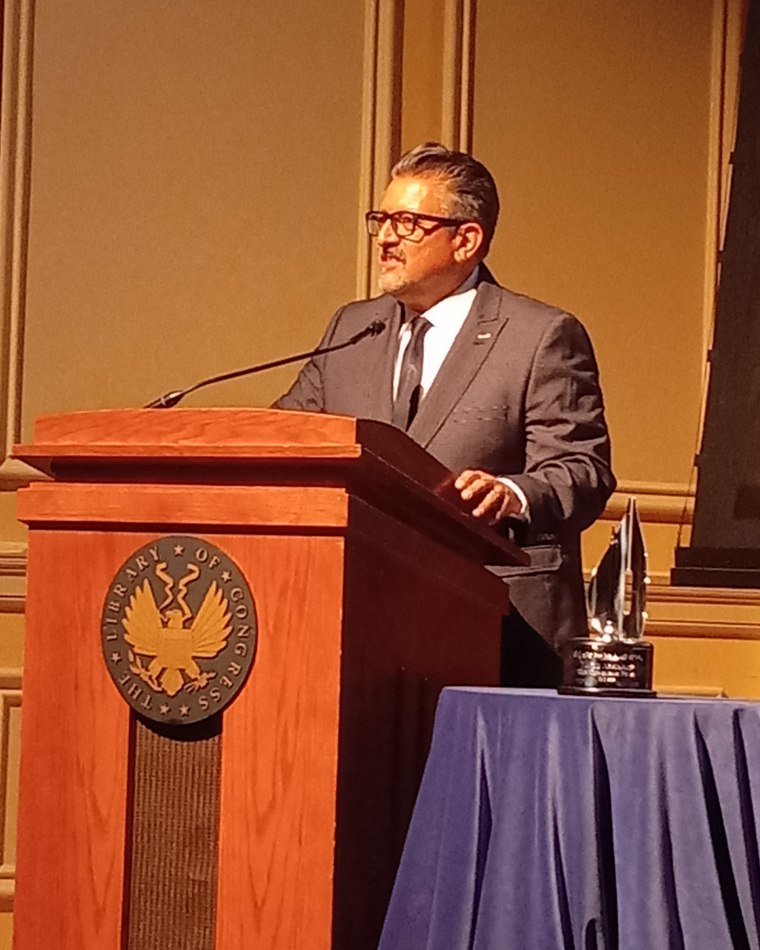 Political cartoonist Lalo Alcaraz giving remarks at a ceremony in his honor after receiving the Herblock Prize for editorial cartooning at the Library of Congress on Tuesday, April 26. 