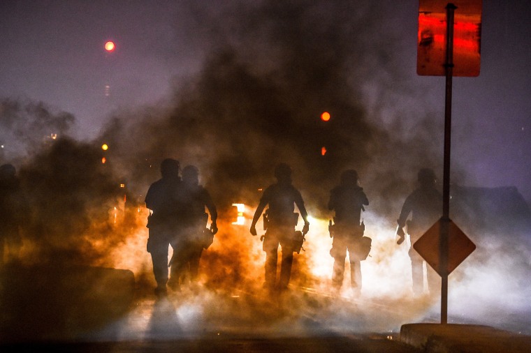 Police use tear gas to disperse a protest in Minneapolis on May 29, 2020, over the death of George Floyd.