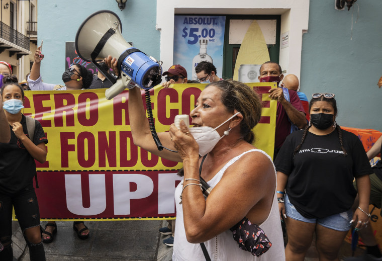 Image: Teacher, students and workers of the University of Puerto Rico protest a budget cut on June 11, 2021 in San Juan.