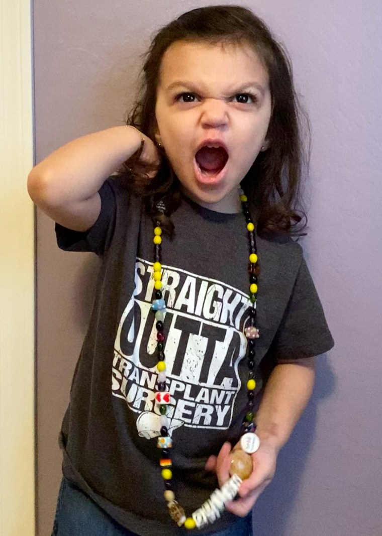 Image: Quinn in her " Straight Outta Transplant Surgery T-Shirt."