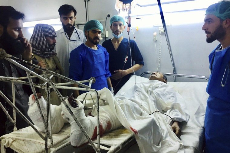 A wounded man is treated at a hospital after a bombing in Mazar-e-Sharif, Afghanistan, on Thursday.