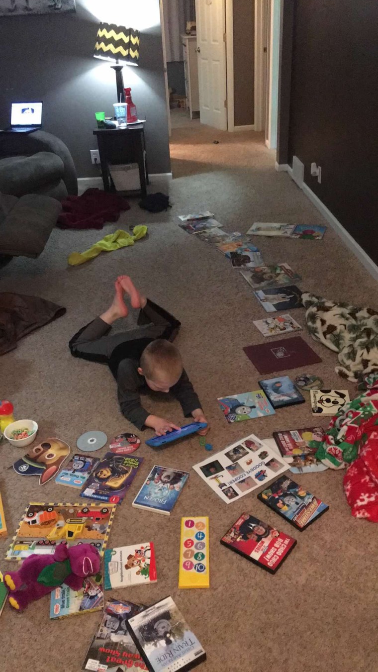 Kate Swenson's son Cooper has autism. He's pictured here surrounded by many of his favorite items.