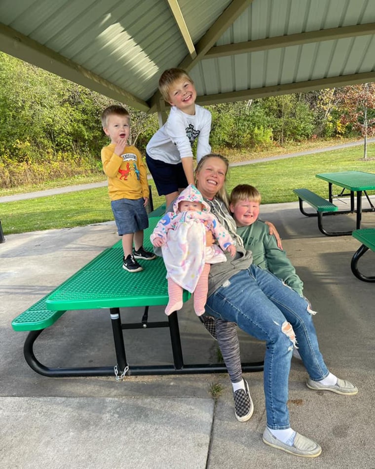 Mom Kate Swenson enjoys an outing with all four of her kids. Her oldest son, Cooper (far right), has autism.